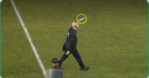 A sight not for the faint-hearted. . Mexico coach Javier Aguirre suffers a horrific injury after Honduran fans throw solid objects at his head.