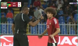 A large shot of Libyan fans taking place during the entrance to the stadium in the fateful match against Benin